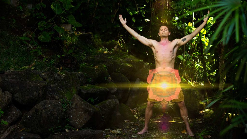 Photo of Taylor Johnson with Root Chakra overlaid his pelvic floor area