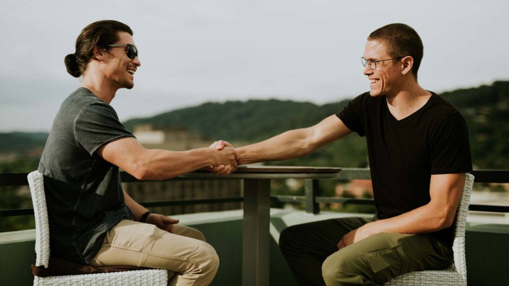 Photo of Sex Coach Taylor Johnson and Client on a Rooftop in Asheville