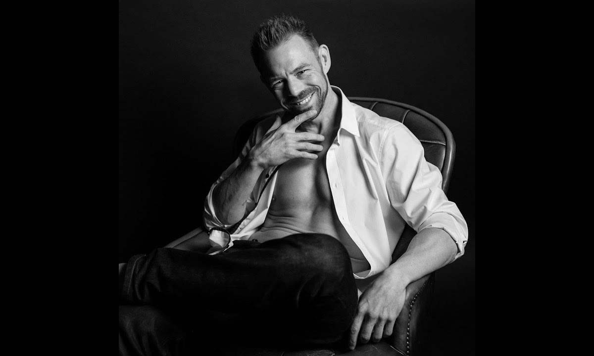 How do pornstars last so long with erik everhard and taylorjohnson sex podcast Lion Galban Looking at the Camera with no shirt and arms spread