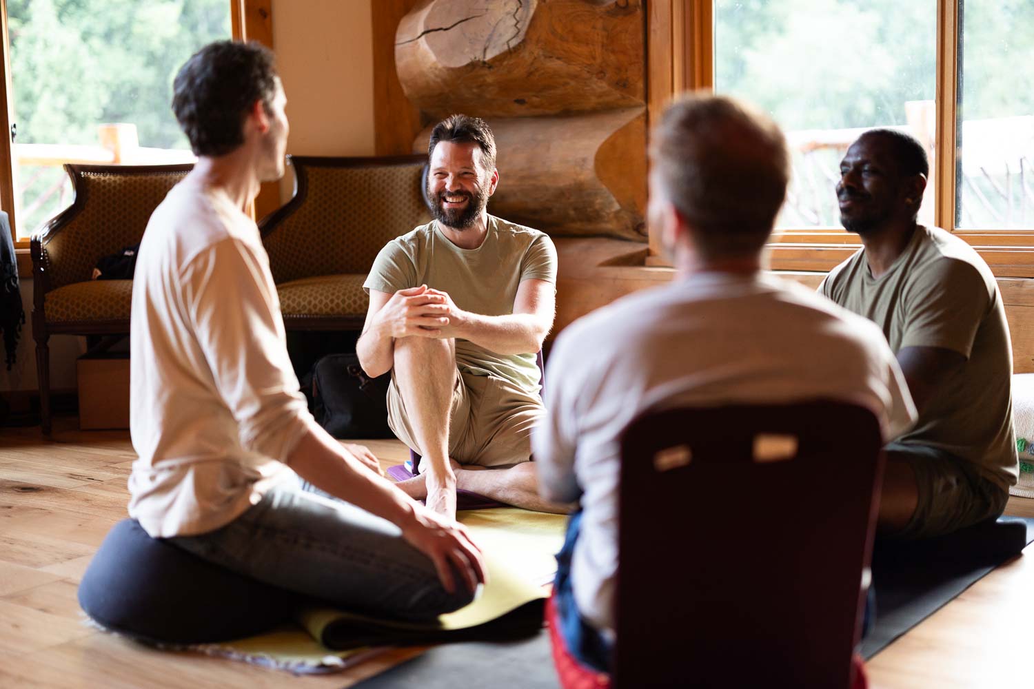Men connecting in a reflection exercise